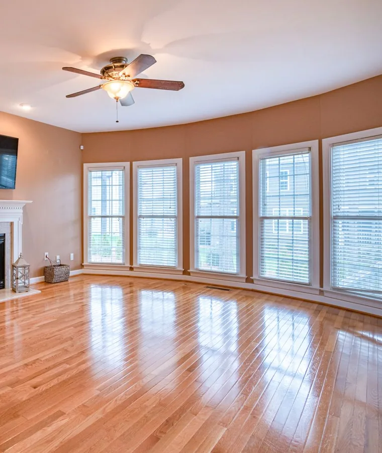 Wood-look waterproof plank flooring installed by Safe Haven Flooring & Tiling